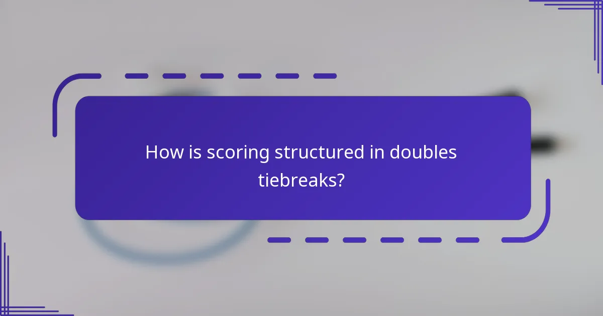 How is scoring structured in doubles tiebreaks?