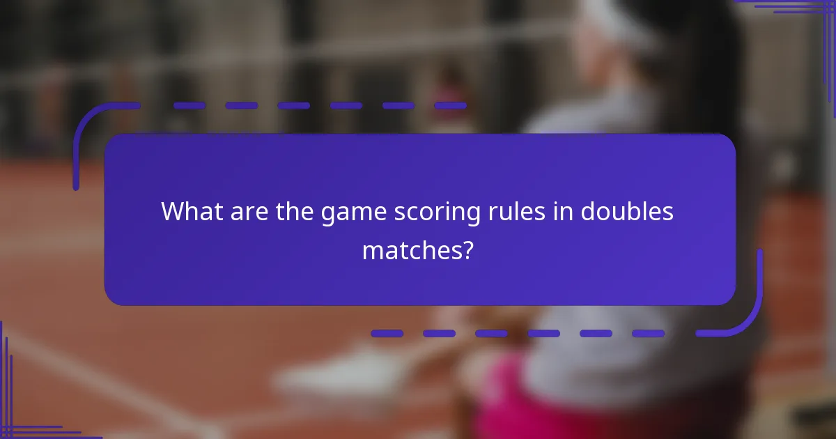 What are the game scoring rules in doubles matches?