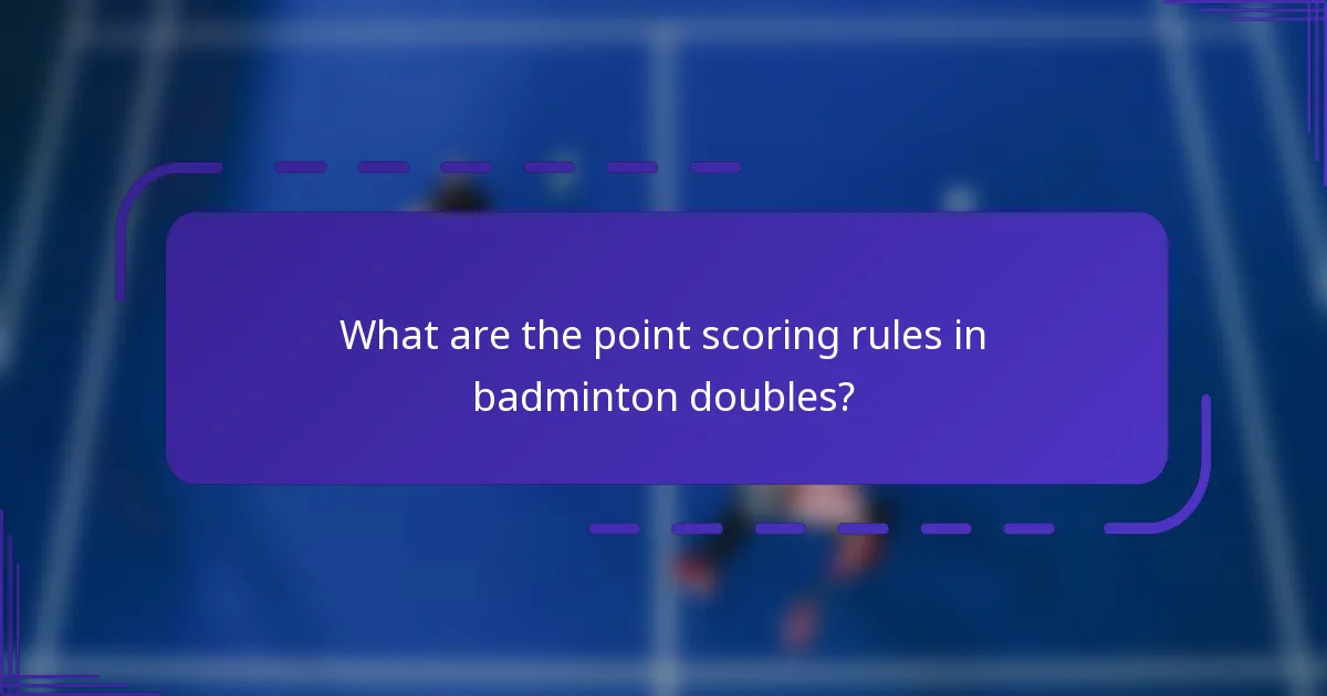 What are the point scoring rules in badminton doubles?