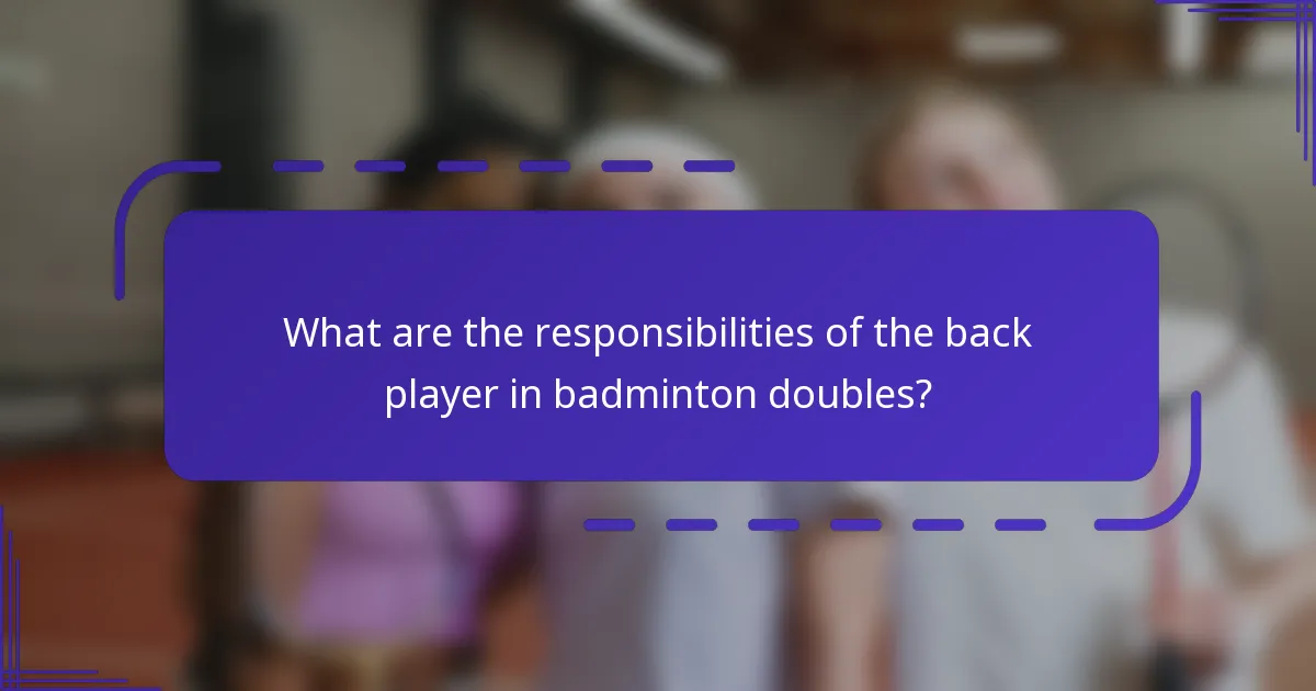 What are the responsibilities of the back player in badminton doubles?